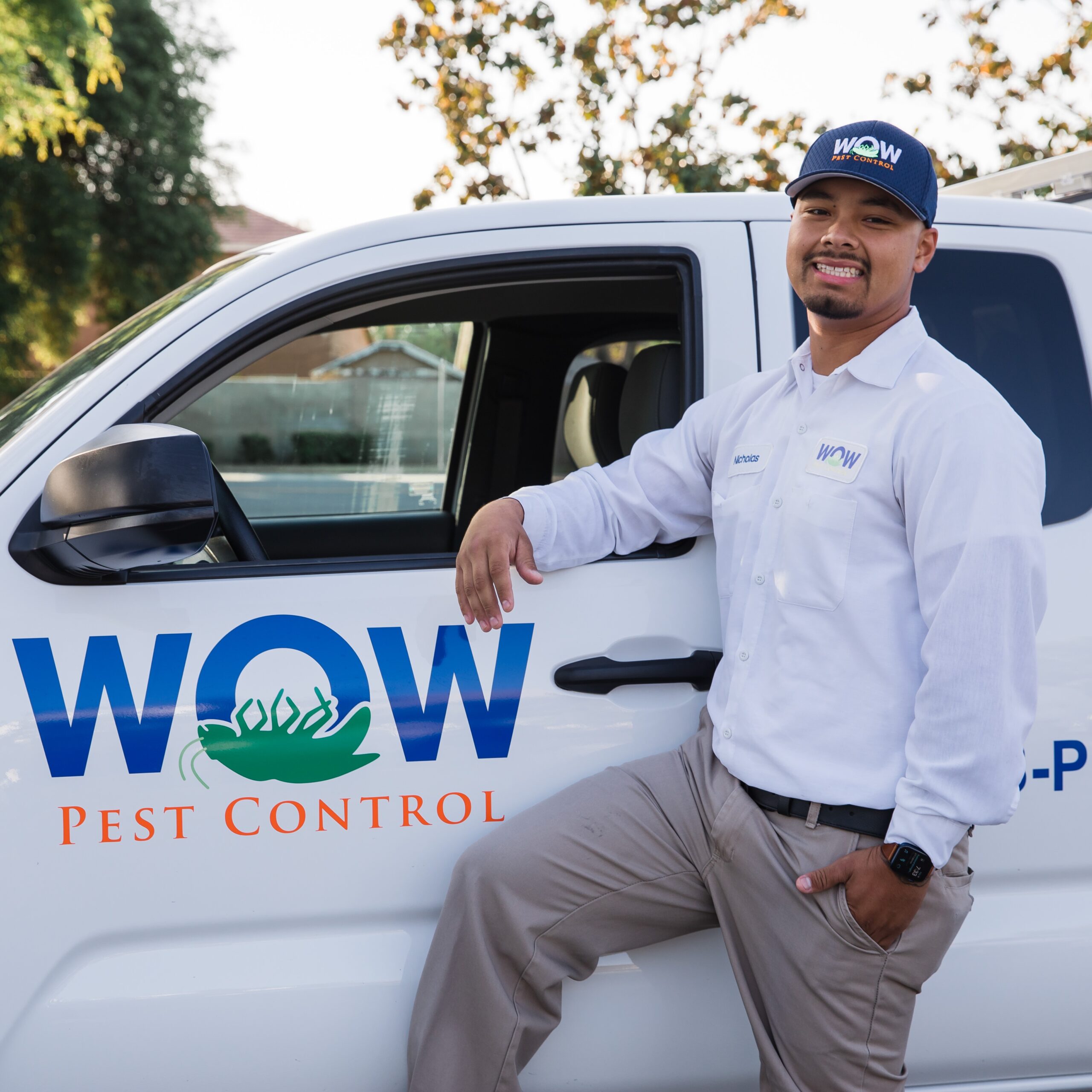 Picture of Wow Pest Control Pest Control Service Expert, Nicholas Recio, next to a company truck.